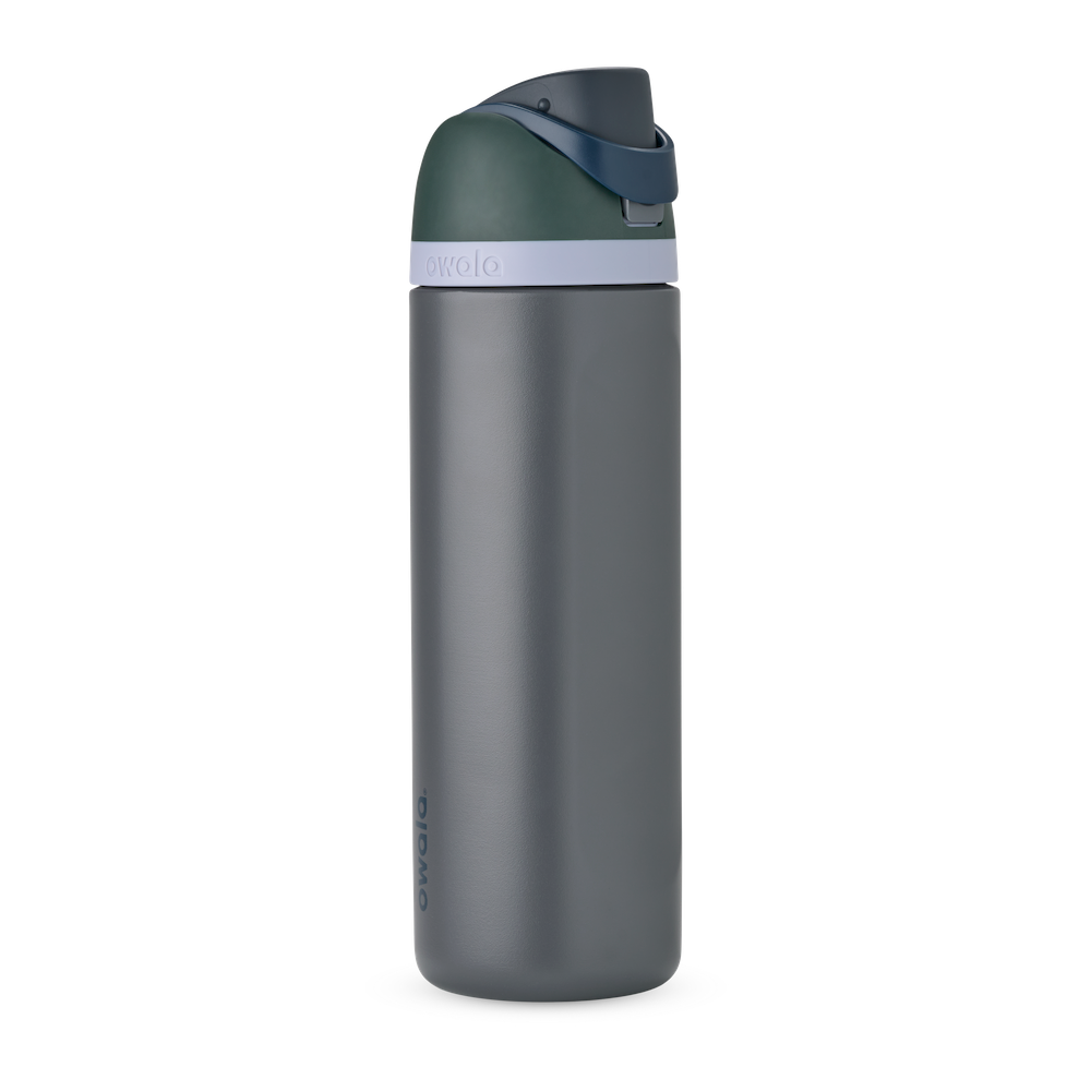 FreeSip 24oz in Off the Grid, charcoal grey body with dark forest green flip cap, navy blue carry loop, and pale lavender accent band