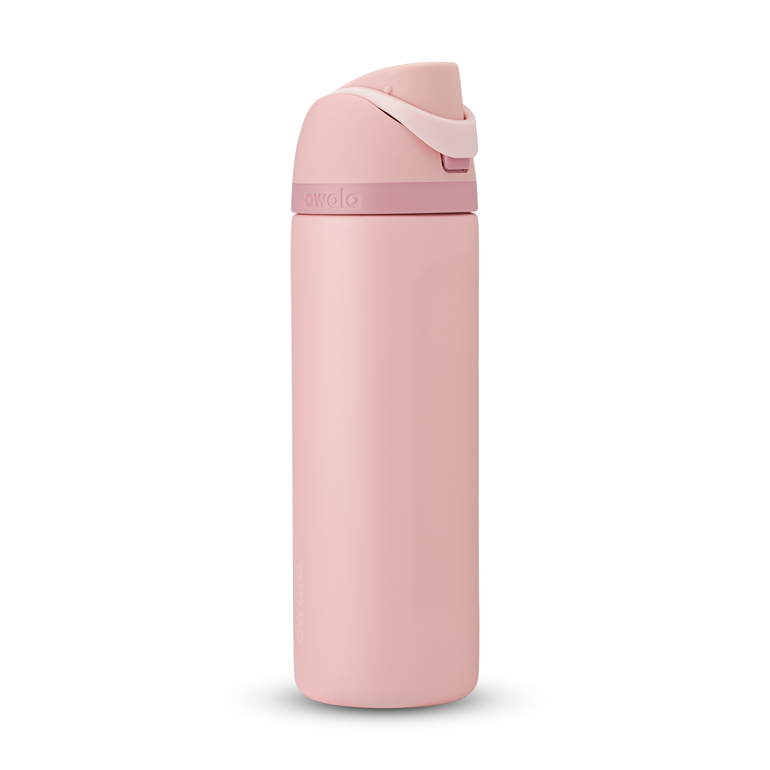 FreeSip 24oz water bottle, soft blush pink body with matching pink flip cap and carry loop