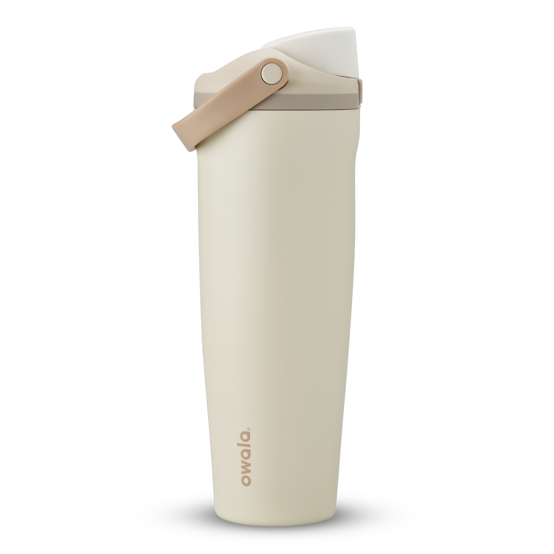 FreeSip Sway 40oz, warm off-white cream tumbler with beige flip cap and tan carry loop; taller 40oz