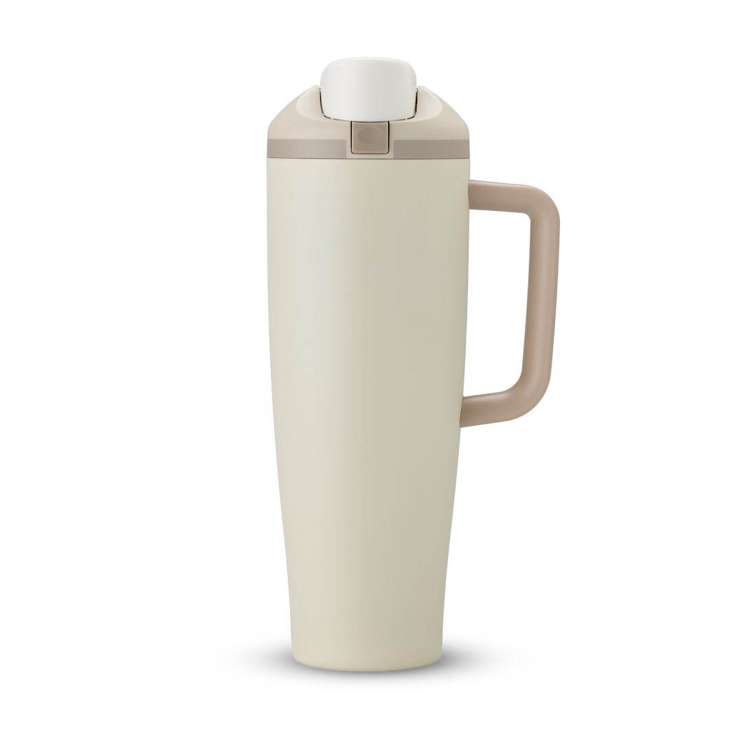 FreeSip Tumbler 40oz in Lightly Toasted — warm off-white/cream body with matching lid and handle, viewed from the handle side