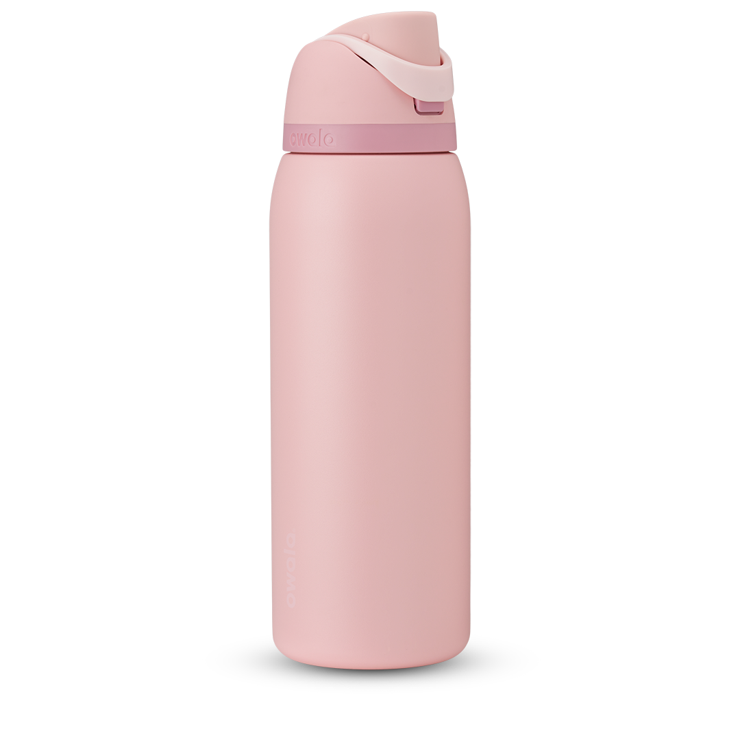 FreeSip 40oz in Rose Quartz, soft pink body with matching pink flip cap, light pink carry loop, and dusty mauve accent band