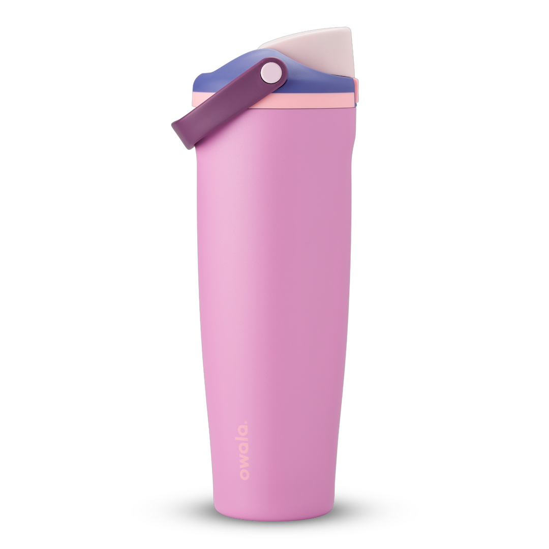 FreeSip Sway 40oz in Pretty in Purple, soft pink insulated water bottle with violet purple flip cap, deep purple carry loop and pale pink accent, lid open
