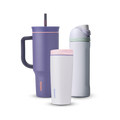 Owala All Day Bundle showing three bottles — a deep purple 40oz Tumbler with side handle, peach pink accent ring, and dark purple straw, a small white insulated cup with pink accent ring, and a white FreeSip with mint green accent band, lavender flip cap, and matching lavender carry loop
