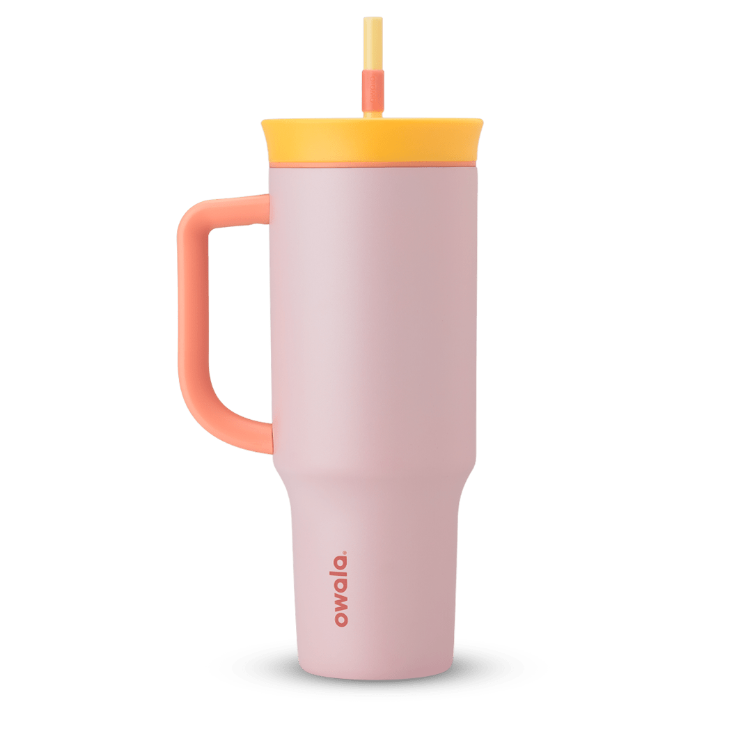 40oz Tumbler in Candy Store, soft blush pink insulated tumbler with coral handle, golden yellow lid, and straw