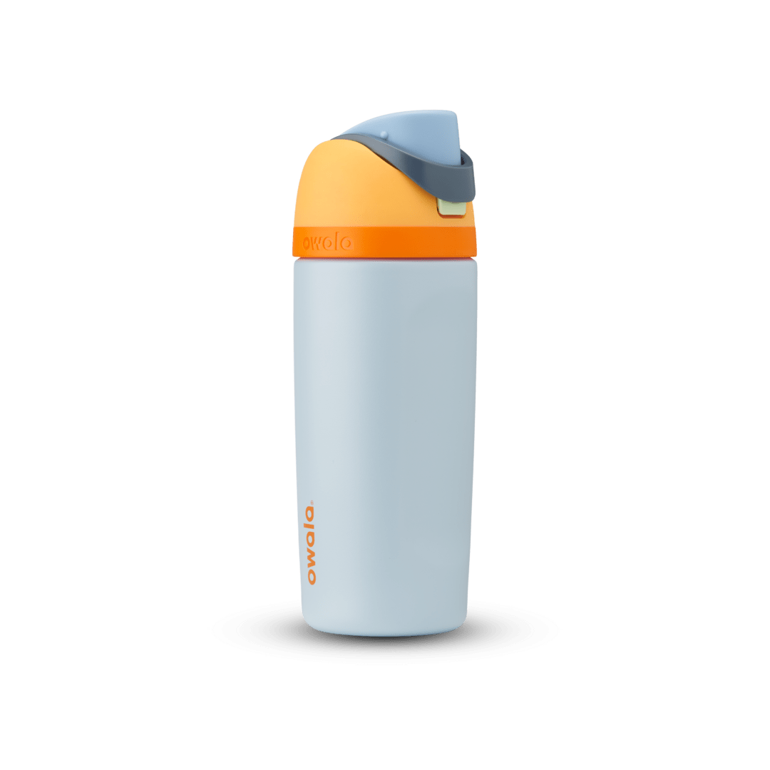 Kids FreeSip 16oz in Blue, light powder blue insulated bottle with bright orange lid and accent band, yellow-orange flip cap, light blue carry loop, and orange Owala logo