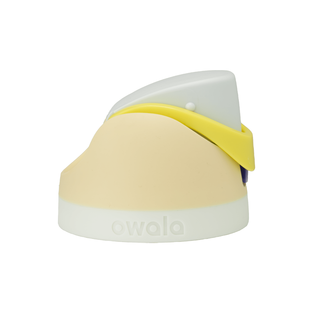 Owala FreeSip replacement lid in Lemon Limeade, pale cream yellow body with light gray flip cap, bright yellow carry loop, and cream white base accent band