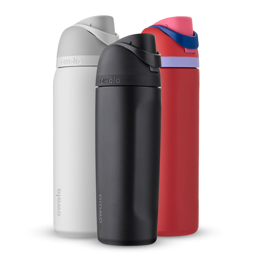 FreeSip Bundle; group of three FreeSip insulated water bottles in white, black, and red with lavender carry loop and navy accent band