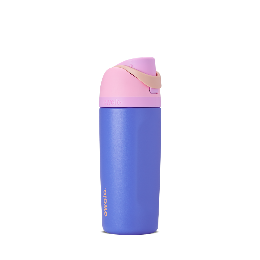 Kids FreeSip 16oz in Wild Child, bright periwinkle blue insulated bottle with pink flip cap, matching blue lid base, and gold carry loop