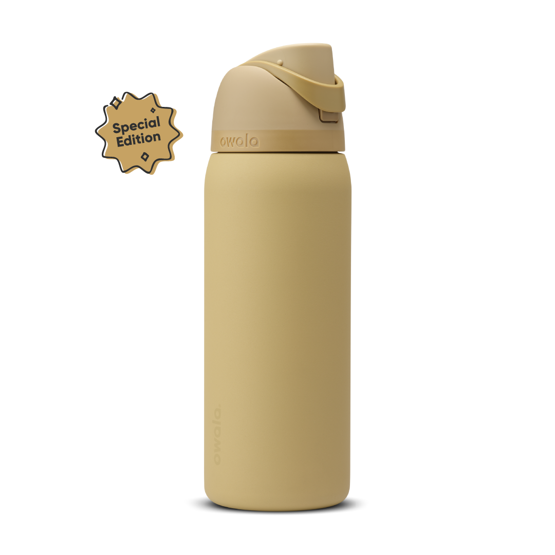 FreeSip 32oz Autumn Vista; warm golden sand body with matching tan flip cap, lighter cream-tan carry loop, and tan lid