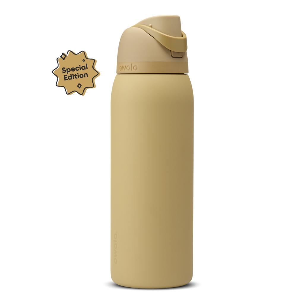 FreeSip 40oz Autumn Vista; warm golden sand body with matching tan flip cap, lighter cream-tan carry loop, and tan lid