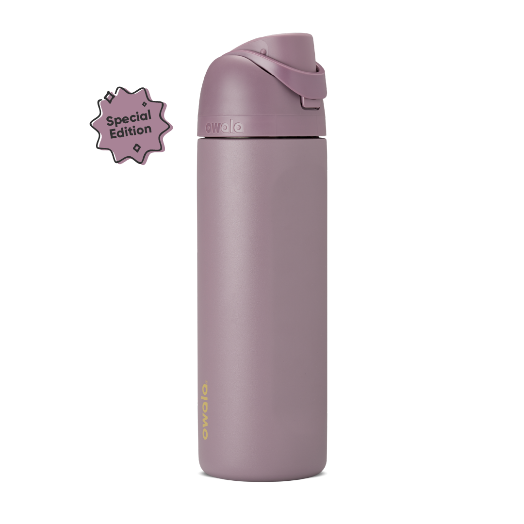 FreeSip 24oz in Spring Revival, dusty mauve-purple insulated bottle with matching flip cap and carry loop, gold Owala logo