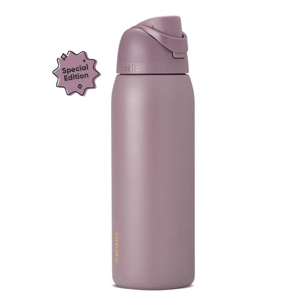 FreeSip 40oz in Spring Revival, dusty mauve-purple insulated bottle with matching flip cap and carry loop, gold Owala logo