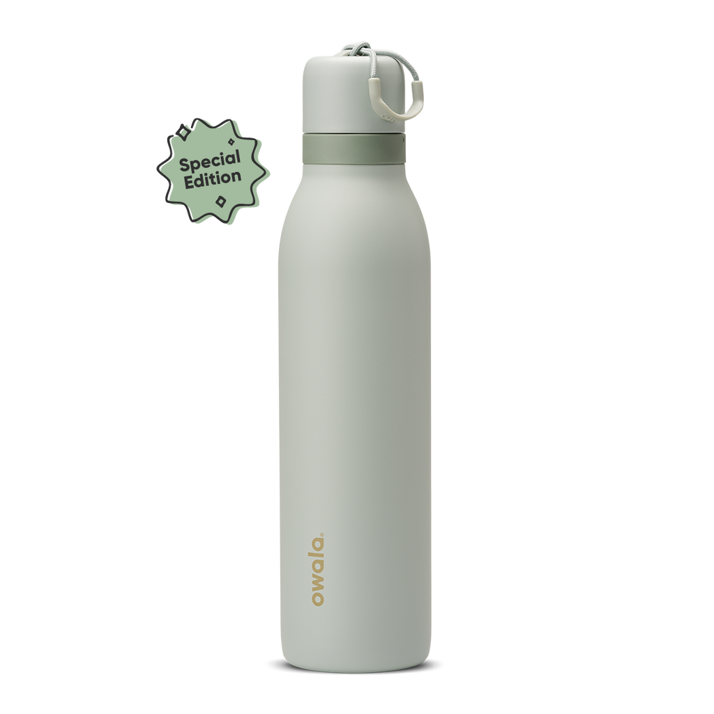 FreeSip Twist 24oz Summer Paradise; soft sage green body with matching pale sage twist cap, sage green twist cap accent band, and cream carry string with pale sage grip