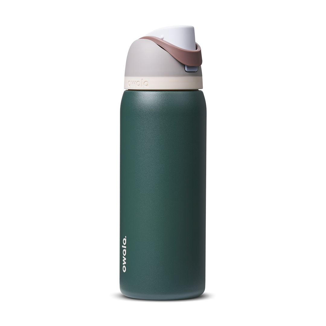 FreeSip 32oz in Serene Evergreen, deep forest green body with cream white flip cap and mauve-rose carry loop