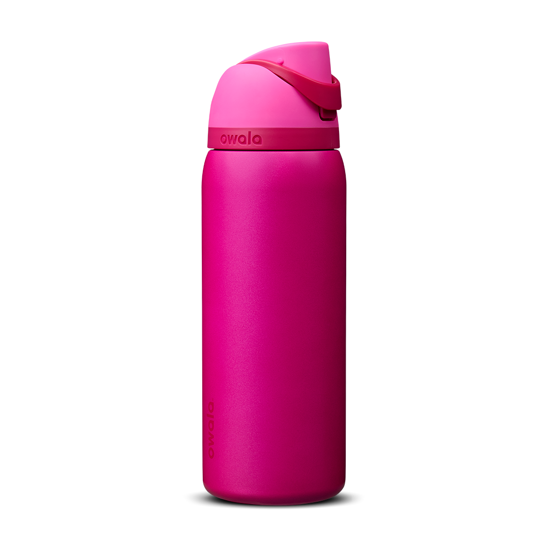 Owala FreeSip 32oz in Read My Lips, deep magenta pink insulated bottle with bright hot pink flip cap and carry loop