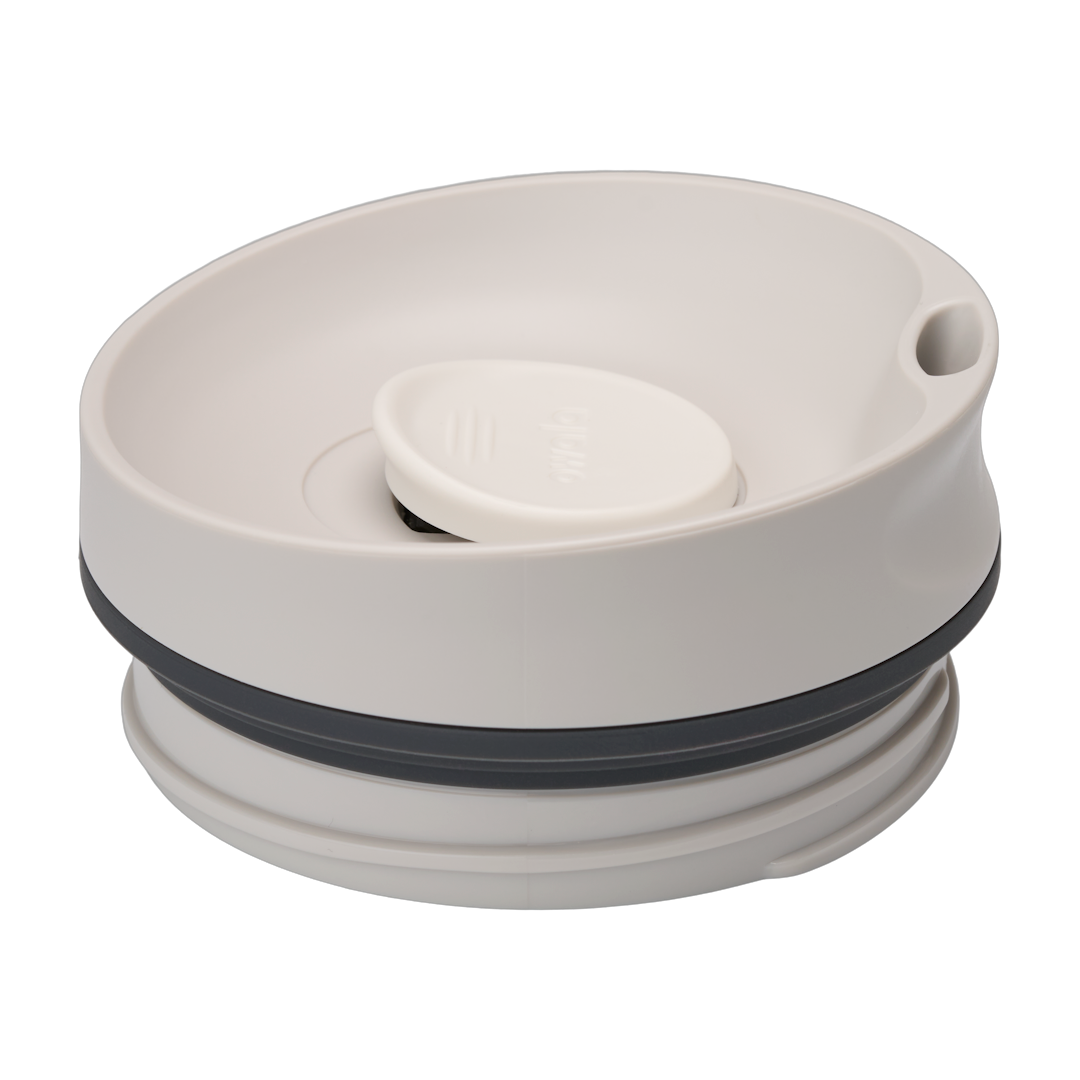 SmoothSip Slider replacement lid in Shy Marshmallow, flat round off-white/cream disc lid with recessed slider button and dark gray sealing ring
