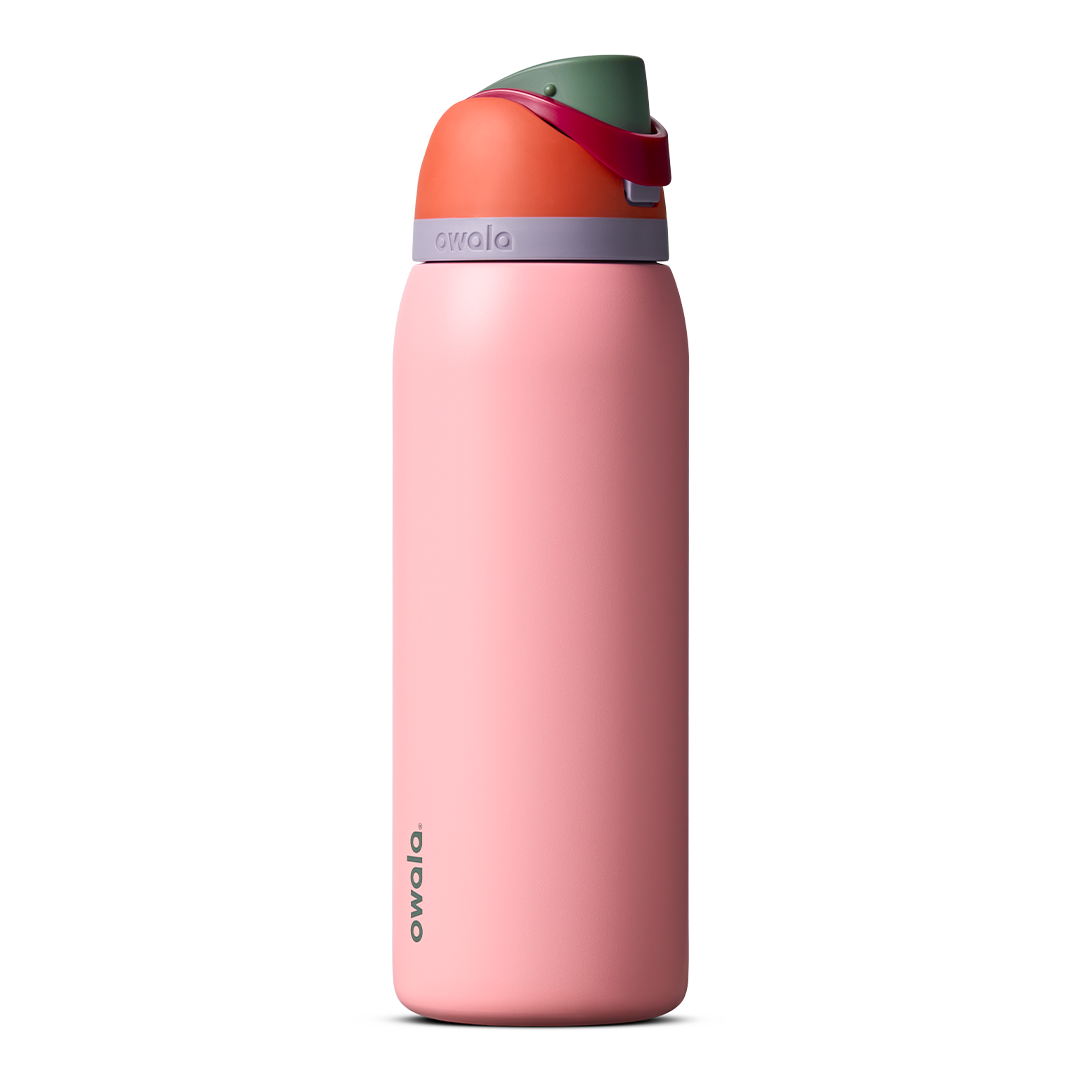 FreeSip 40oz in Sugar High, coral pink insulated bottle with rust orange flip cap, forest green accent band, and purple carry loop