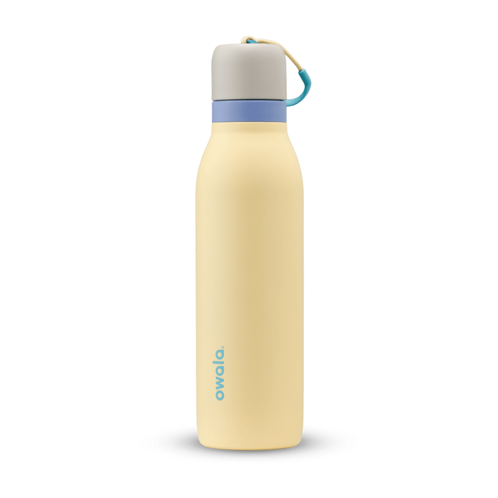 FreeSip Twist 18oz in Sunny Daze, pale yellow insulated water bottle with light gray twist cap, periwinkle blue twist cap accent band, and teal carry string with grip